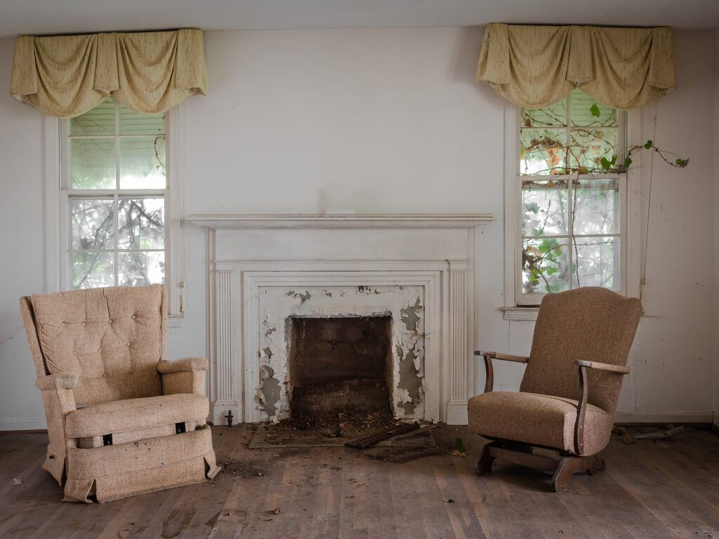 a living room in an abandoned house