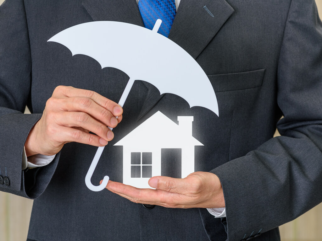 umbrella protecting a house from a lien